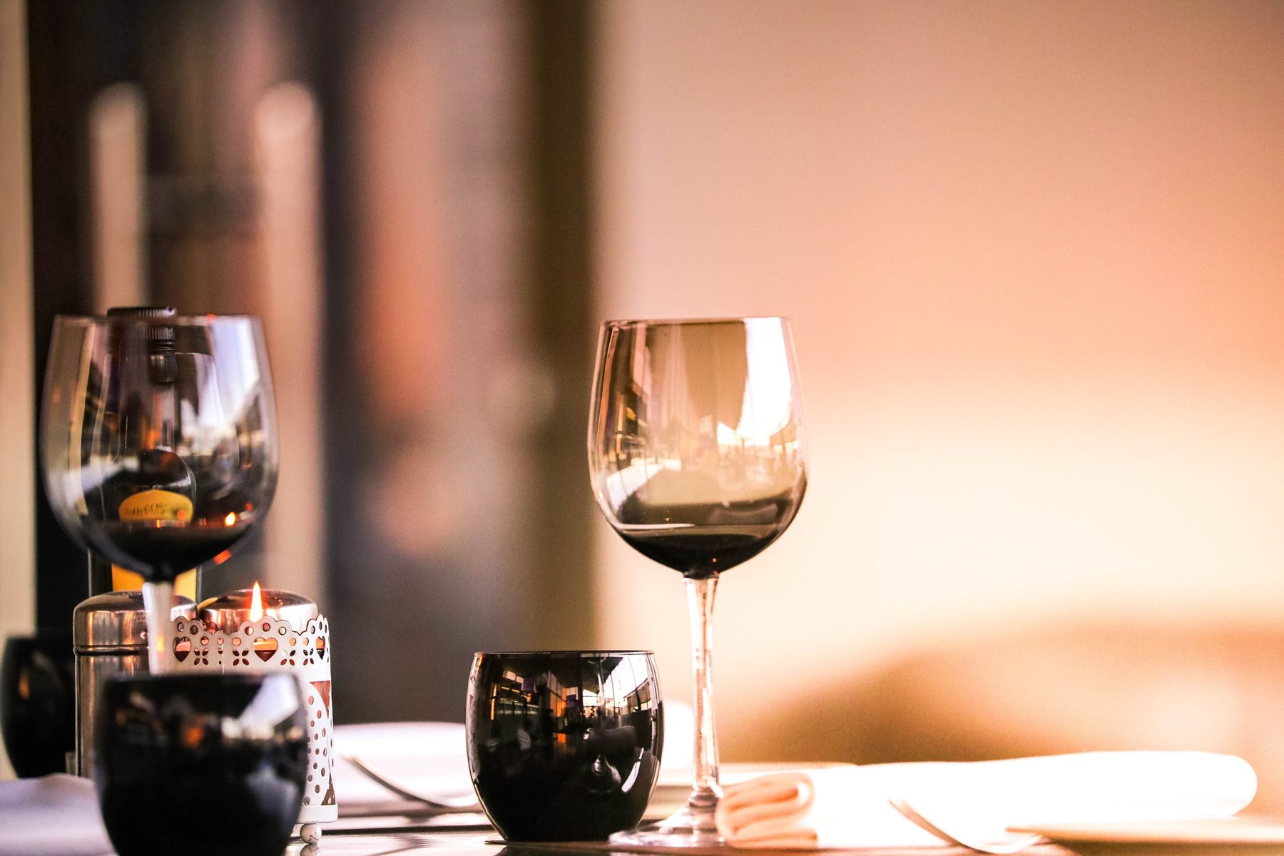 Two glasses of red wine in warm evening light