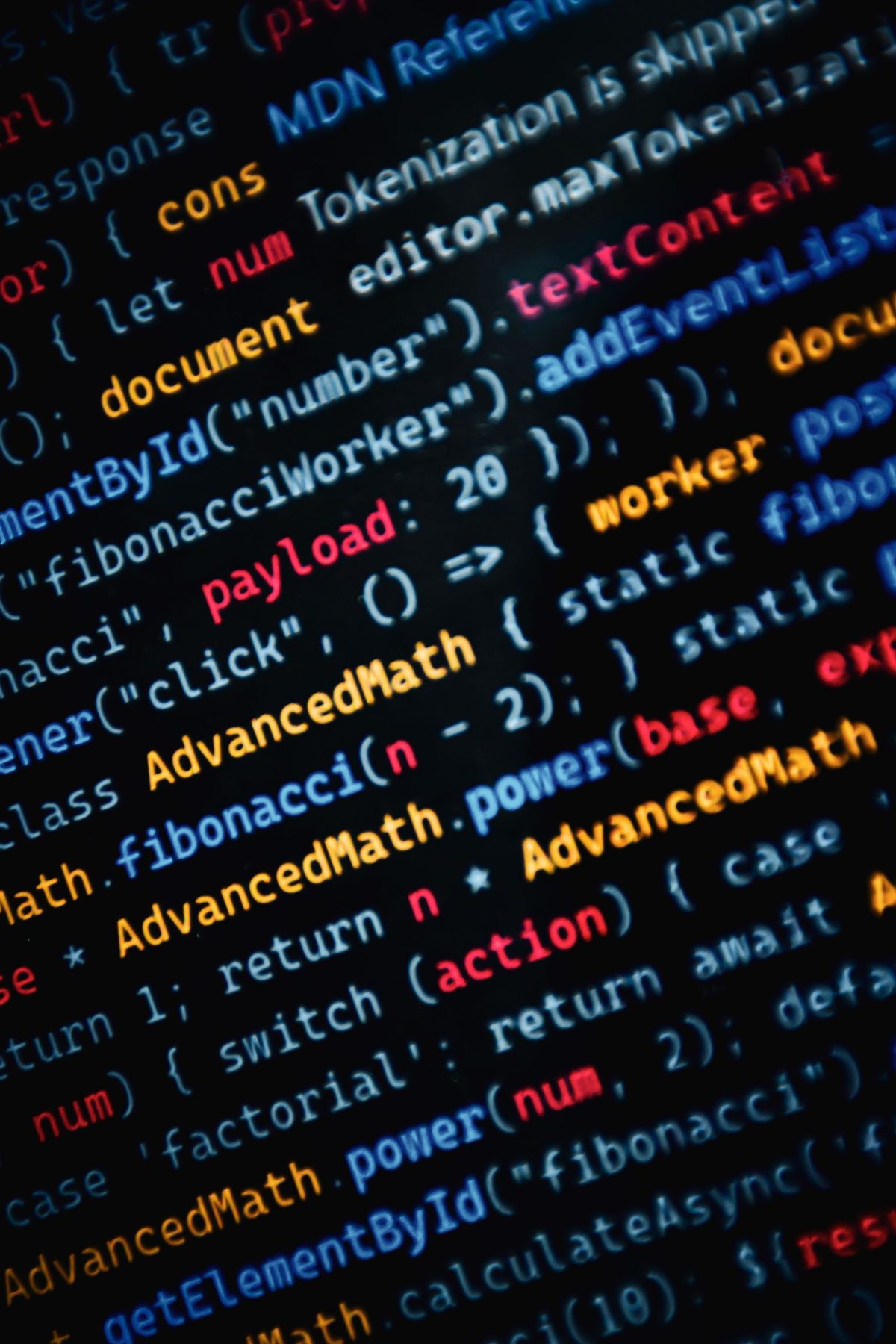 Lines of colourful code on a dark screen
