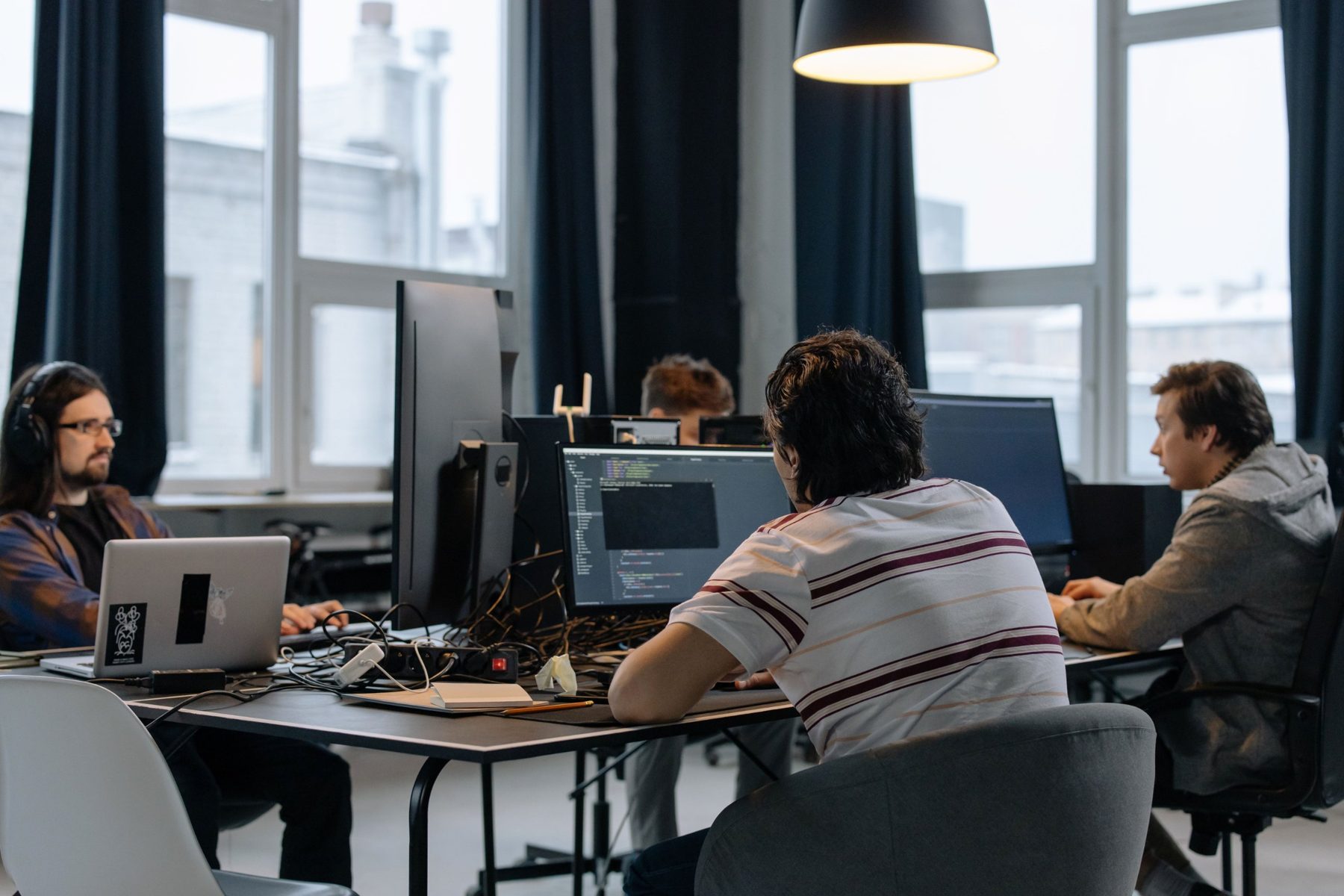 A team working together at desks in a bright office